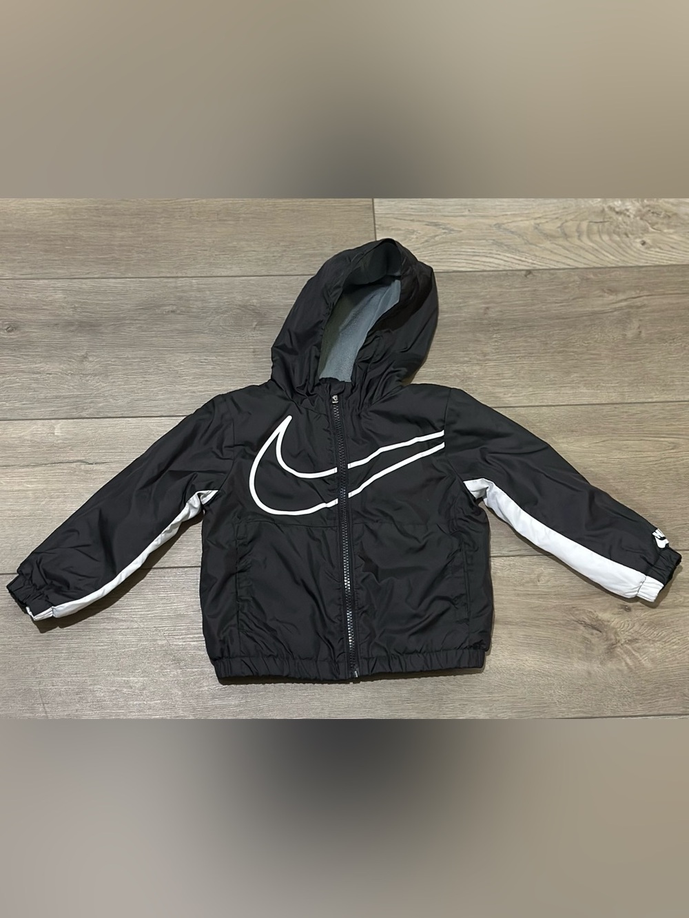 Nike Kids Black and White Hooded Rain Jacket